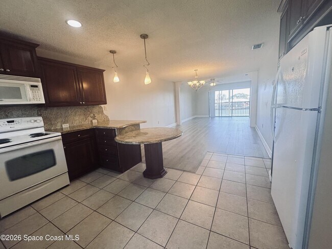 Photo - 325 S Banana River Blvd Unit 209