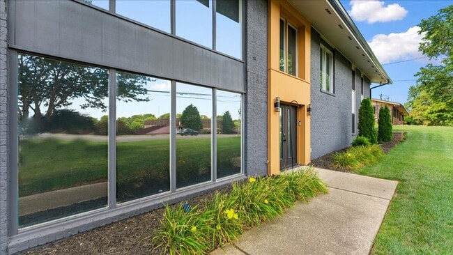 Photo - Renovated Mid-Century Modern Home in Belmont West with Finished Basement & Fenced Yard