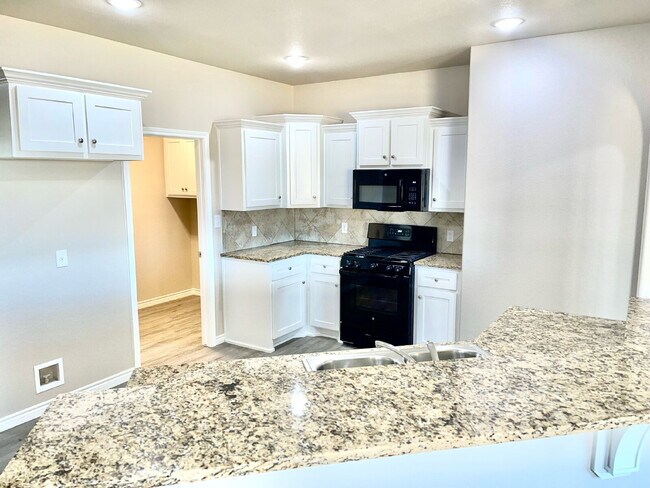 Photo - Beautiful 3-Bed Oasis with Granite Touches in Lubbock – 1650 Sq. Ft. of Comfort!