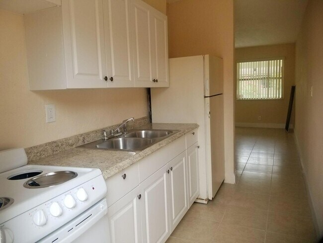 418 NW 13th Ave