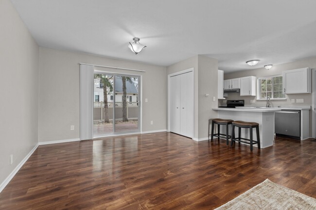 Patio door leads to wooden deck - W6155 Aerotech Dr Rental