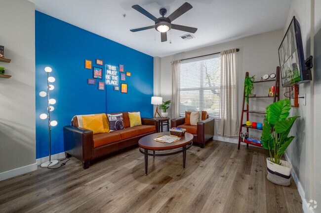 2BR, 2BA - 713SF - Living Room - The District on 5th