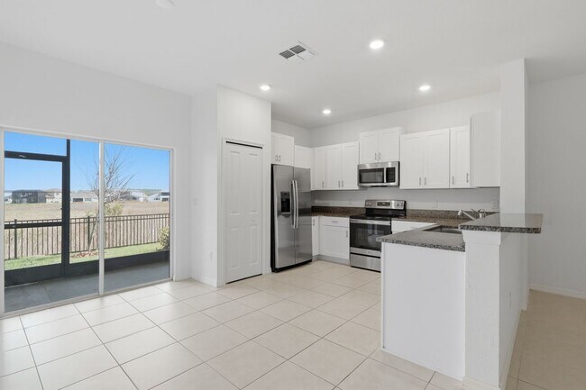 Photo - 32127 Powderpuff Mimosa Dr