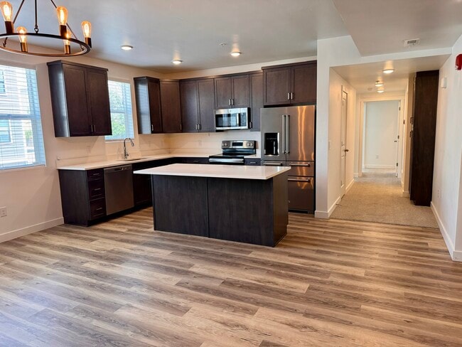 Kitchen + Living - 8395 S Iris Lumi Ln Condo