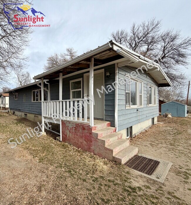 Photo - Spacious 5-Bedroom Home with Open Layout, Off-Street Parking & Large Backyard