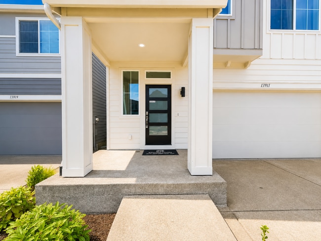 Photo - Stunning 2024 Built 5BR Home with Main-Level Suite, EV Charger & Covered Patio Near River Terrace