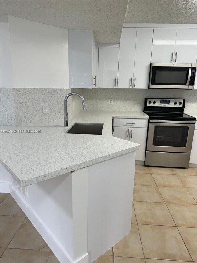 Photo - 8801 Wiles Rd Unit 103