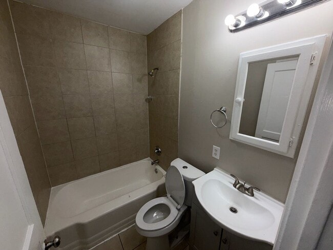 Photo - Charming 3-Bed, 1-Bath Home with Spacious Yard