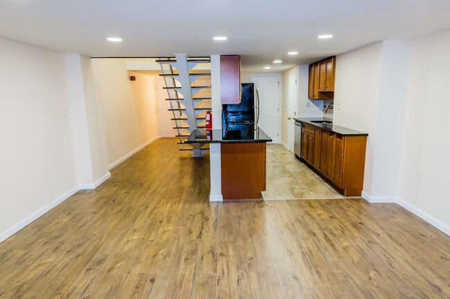 View of the kitchen from livingroom - 40 Fayette St Unit 39