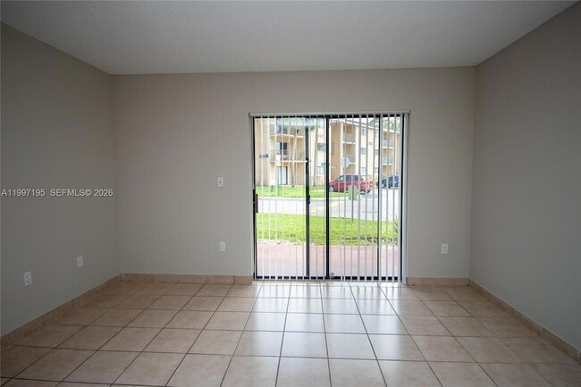 Photo - 9491 Palm Cir S Unit 101