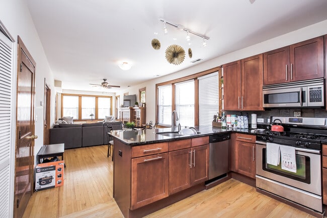 Photo - HUGE Condo Quality 3bed/1bath in Bucktown!  Central Air! In-unit Laundry! Private Deck! Unit 1