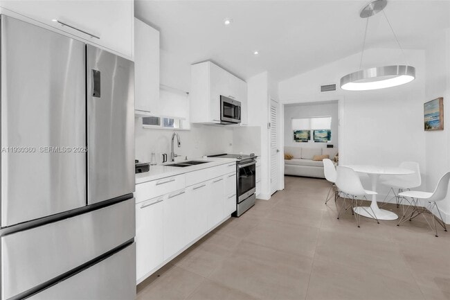 Building Photo - 836 W 40th St Unit 3