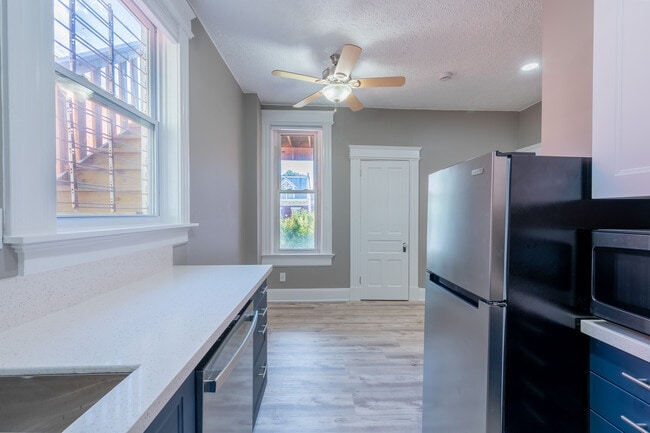 view from kitchen into open concept living room - 304 Warner St Unit 2