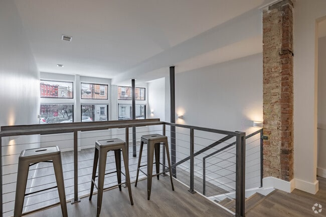 Custom Metal Bar Overlooks Living Room - 50 E McMicken Ave