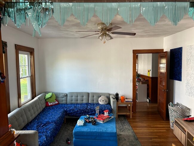 Half of double parlor living room - 221 Market St Unit 1