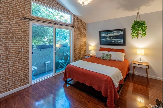 Front bedroom with balcony. - 1554 N Hobart Blvd Unit 2