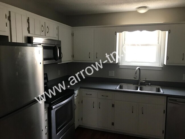 Photo - Great 2 Bed Townhome with 2.5 Baths and a Fenced Backyard!