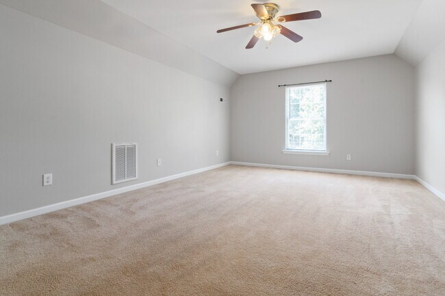 Photo - Spacious 4BR/3BA Home Near Downtown Durham | Deposit-Free Living | 1st-Floor Bedrooms