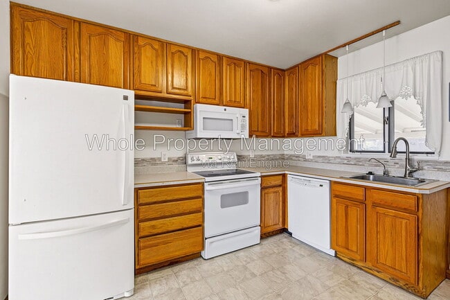 1406 E 108th Pl