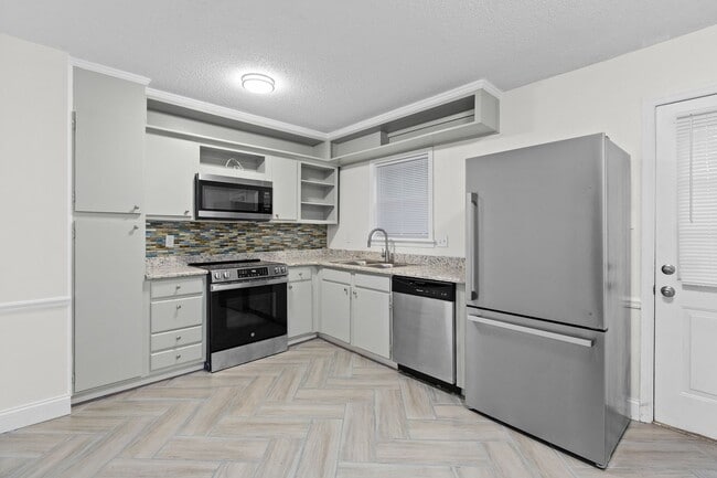 Photo - Updated Two-Bedroom Condo with New Kitchen Appliances and Private Patio