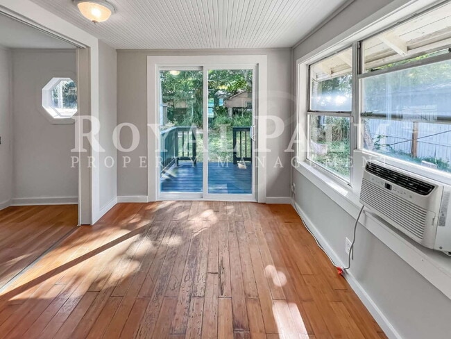 Photo - Deck the halls or the French doors, because this charming century-old single family home is avail...