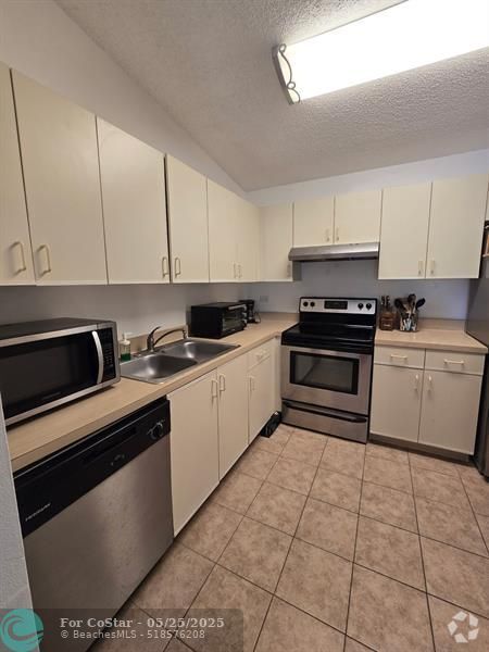Building Photo - 3650 N 56th Ave Unit 520 Rental