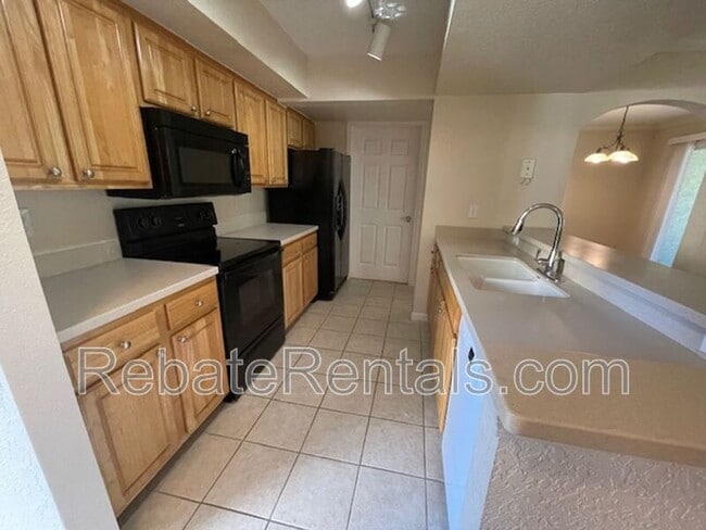 Photo - 10075 Gate Pkwy N Unidad #604