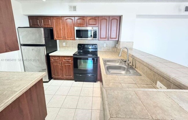 Photo - 1715 Village Blvd Unit 102