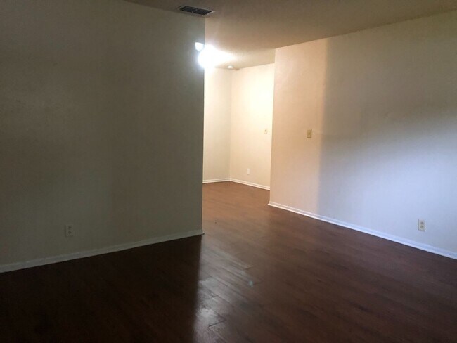 Photo - SPACIOUS 3BR/1.5BA w/Carport, Beautiful Wood Finish Flooring, Privacy Fenced Backyard! NO APP FEE!