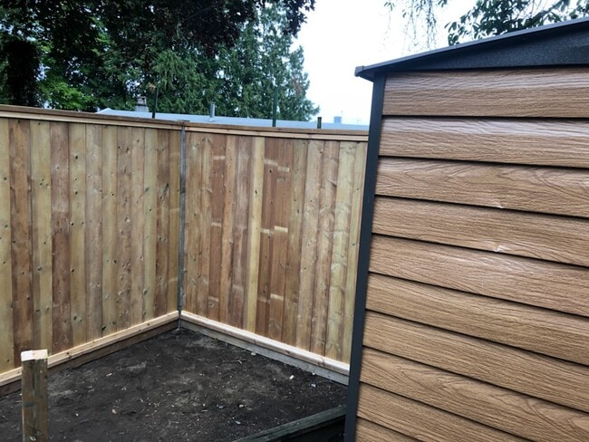 Fully fenced backyard with garden shed - 11535 Millar Rd