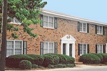 Explore this charming apartment with beautiful brick architecture and inviting surroundings. - Corder Ridge