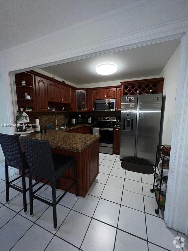 Building Photo - 5775 W 20th Ave Unit 215 Rental