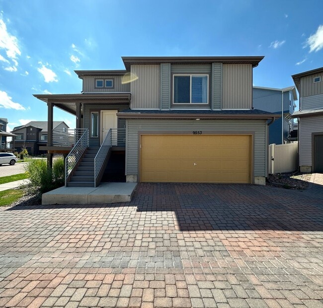 Building Photo - GORGEOUS 2 BEDROOM CARRIAGE HOME IN THE STUNNING BANNING LEWIS RANCH NEIGHBORHOOD!!!!!!