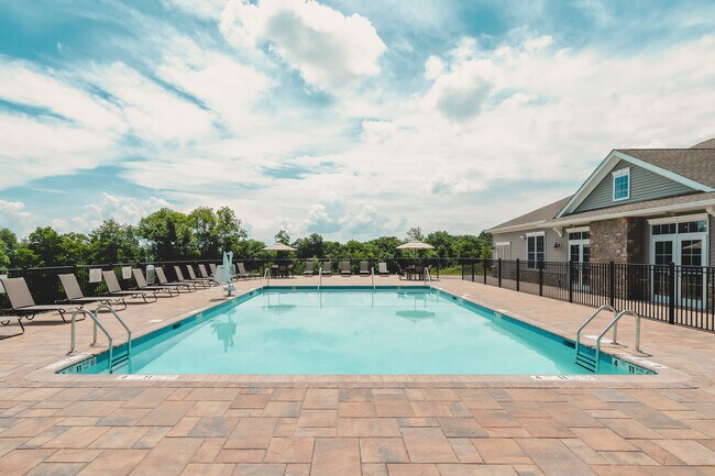 Experience relaxation by the heated outdoor pool, perfect for basking in the sun or enjoying a refreshing swim.