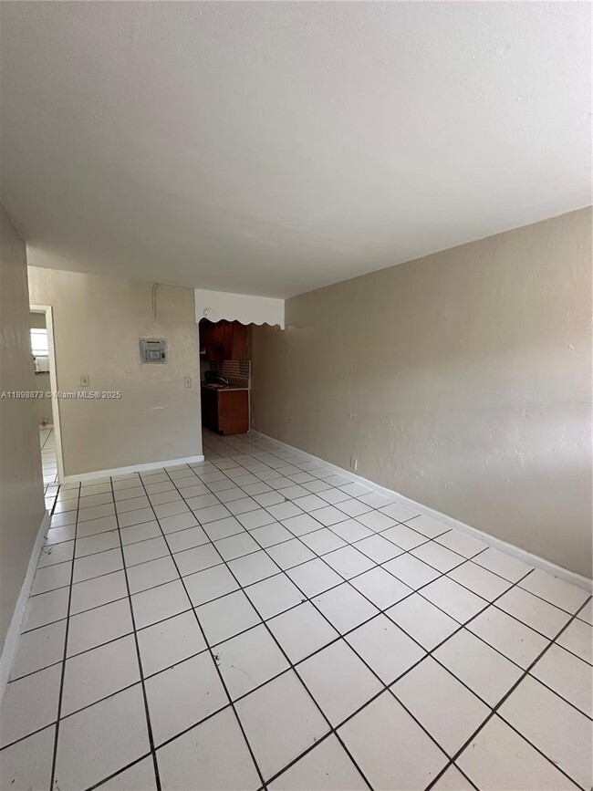 Building Photo - 5797 Flagler St Unit 2