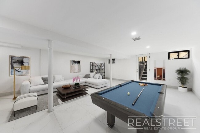 Photo - STUNNING 4+ BED 3 BATH DUPLEX + YARD IN PRIME BUSHWICK TOWNHOUSE Unit 1