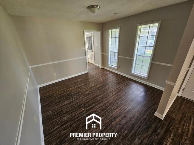 Photo - Charming 3BR/2BA Kirby Mills Cove | Hardwood Floors, Rustic Brick Fireplace & Garage