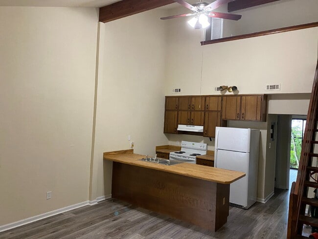 Photo - Perfect 1 Bedroom 1.5 Bathroom Townhome! Newer Flooring, Paint, and Appliances!