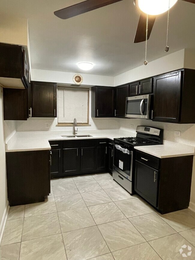 Building Photo - 3307 Highland Ave Unit Garden North Rental