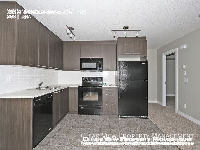 Photo - Beautiful 2 bedroom Condo with New Carpet in Chestermere Station!! Unit 235