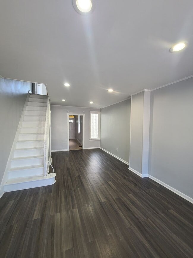 Building Photo - Three Bedroom one bath with off street parking