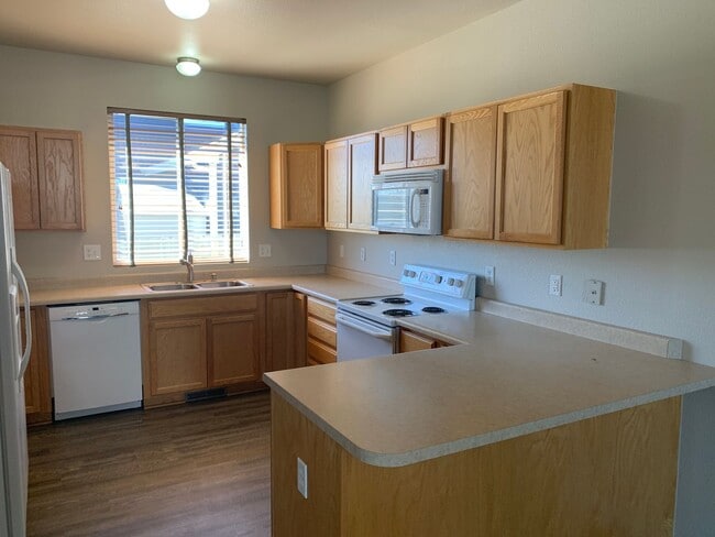 Photo - 4 BEDROOM, 3 BATHROOM SINGLE FAMILY HOME WITH 2 CAR ATTACHED GARAGE
