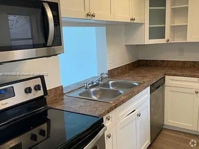 Building Photo - 2800 NW 56th Ave Unit A202 Rental