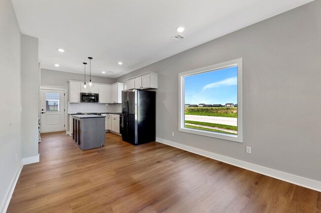 Photo - Modern 3-Bed Ranch in Maize – Zero-Entry L...