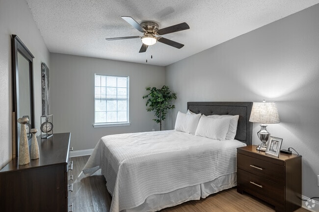 2BR, 1BA - 860SF - Primary Bedroom - Residences at the Overlook