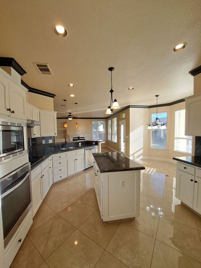 Photo - Spacious 5-Bedroom Fresno Home with Garage and Backyard!