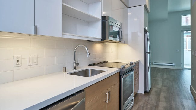 Kitchen with Stainless Steel Appliances - Mark on 8th