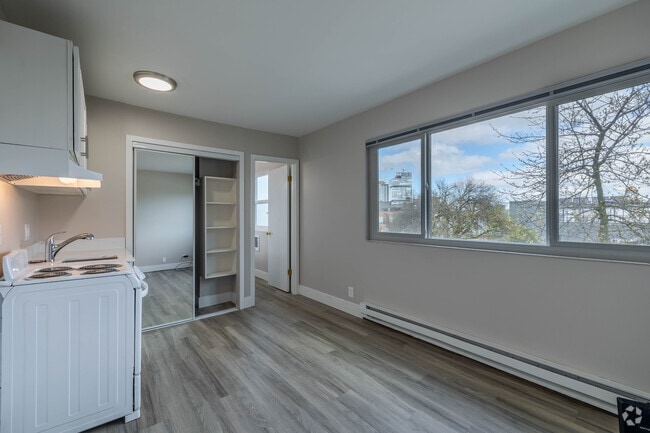 Studio - Living Room, Kitchen, and Closet - Union Plaza Apartments