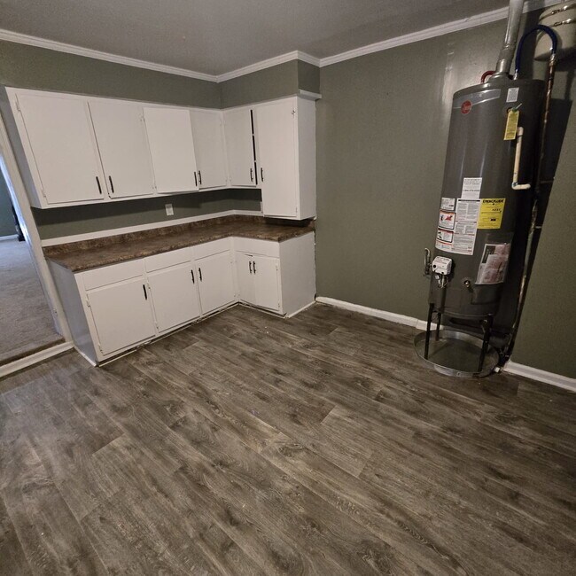 Photo - Great Craftsman style home with large private yard that's partially fenced.