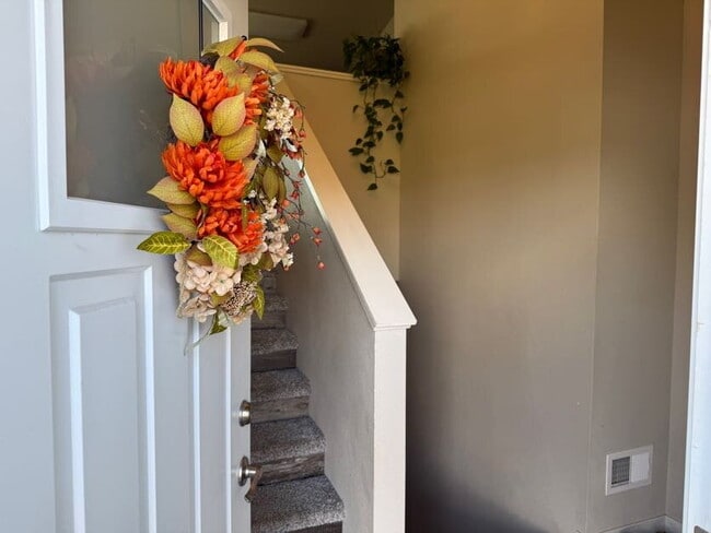 Photo - Spacious 4-Bed, 2-Bath Split-Level Townhome with Attached Heated Garage